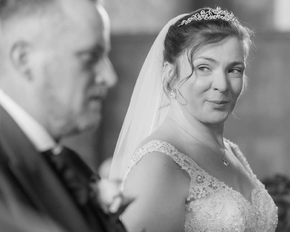 Bride looking at Groom lovingly, Stokenteignhead.